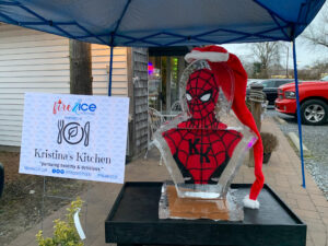 a statue of a spider man is on display