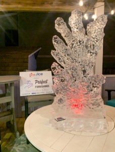 a large ice sculpture sitting on top of a white table