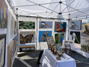a tent with paintings and pictures on it