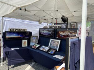 a tent with paintings and pictures on it