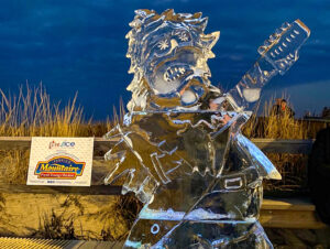 an ice sculpture of a man holding a guitar