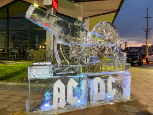 an ice sculpture with the word ac dc on it