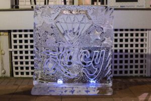 an ice sculpture with the word joy on it