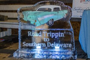 an ice sculpture with a car on it