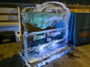 an ice sculpture with a car on it