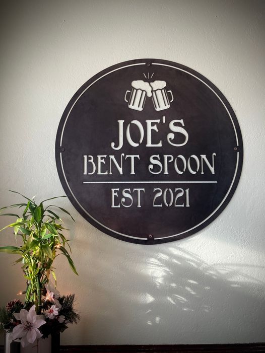 a sign that says joe's bent spoon est 2091
