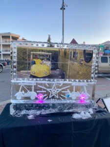 an ice sculpture with a yellow chair on it