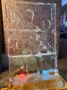 an ice sculpture with a red light on it