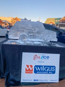 an ice sculpture of a car is on display