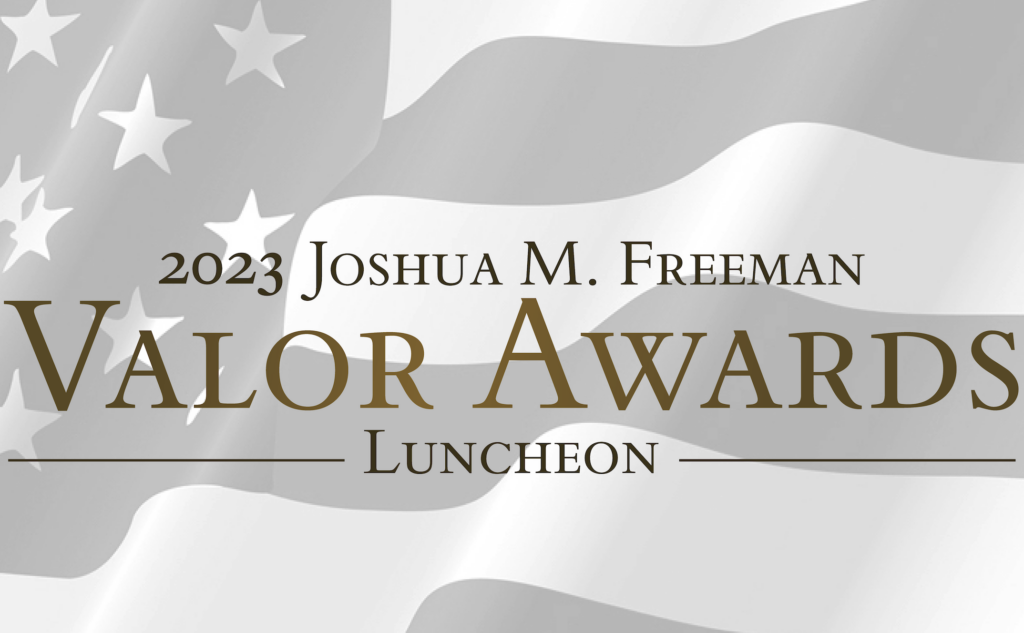 a flag with the words valor awards luncheon