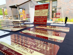 a table topped with lots of red and gold signs