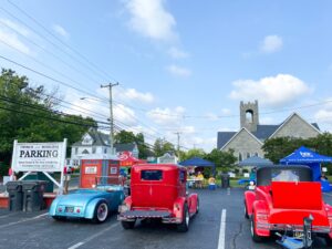 an old timey car show with classic cars
