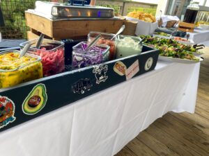 a buffet table filled with lots of different foods
