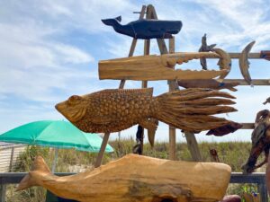 a wooden sculpture of fish and other marine creatures