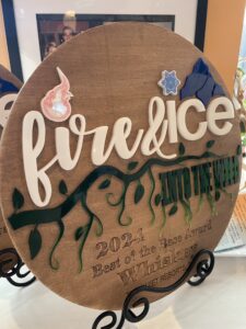 a wooden sign that reads fire and ice