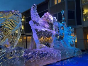 three ice sculptures in front of a building
