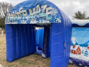 a blue inflatable tent with snow scenes on it