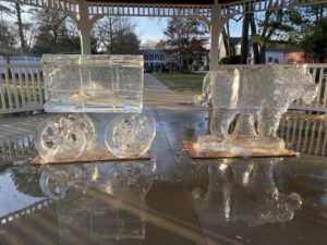 two ice sculptures sitting on top of a table