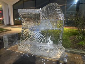 an ice sculpture in front of a building