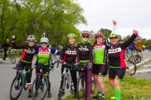 a group of people on bikes posing for a photo