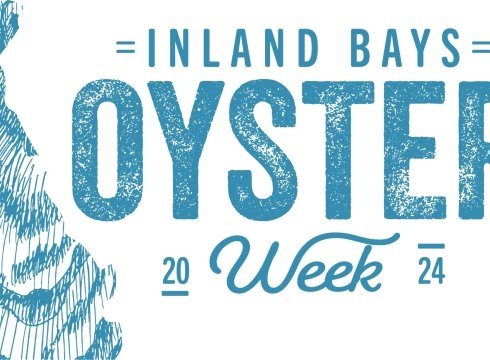 a blue and white sign that says inland bays oyster week